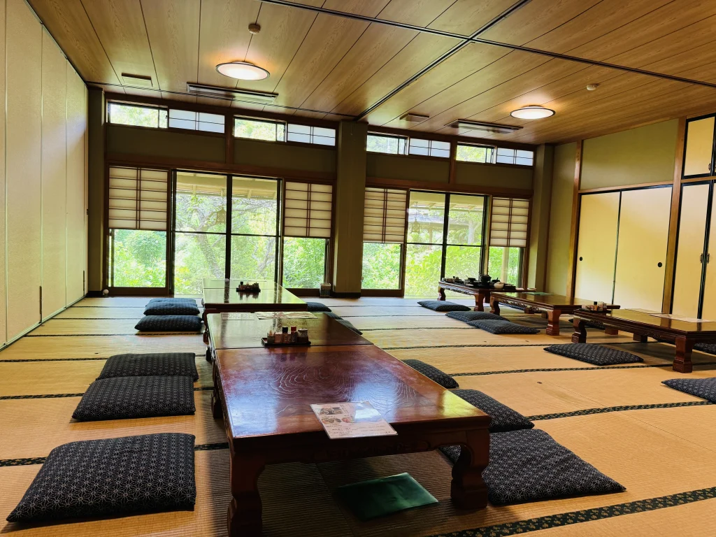 Tatami-style seating inside Genji Kamameshi Matsuba Chaya, offering a cozy and spacious dining area
