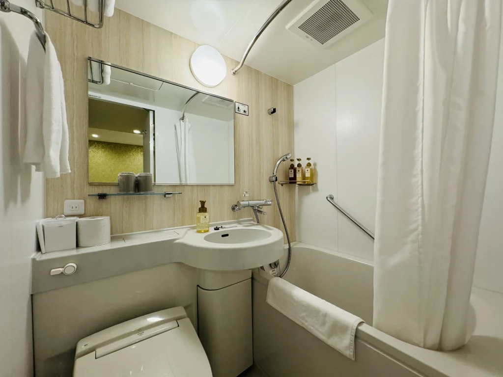 Tatami room with unit bathroom at Kuretake Inn Premium Shizuoka Annex