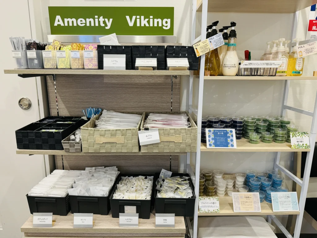 Amenity station with various toiletries and self-service items at Kuretake Inn Premium Shizuoka Annex