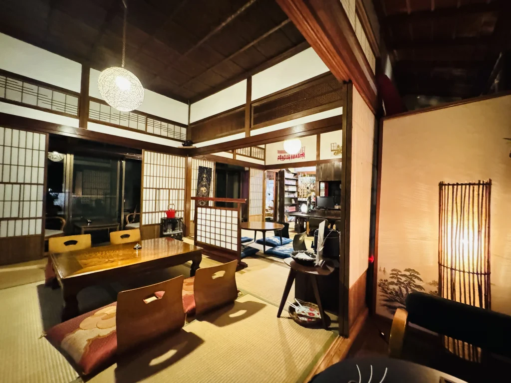 Interior of Kominka Café Amane with a cozy, retro-modern atmosphere in Shuzenji Onsen