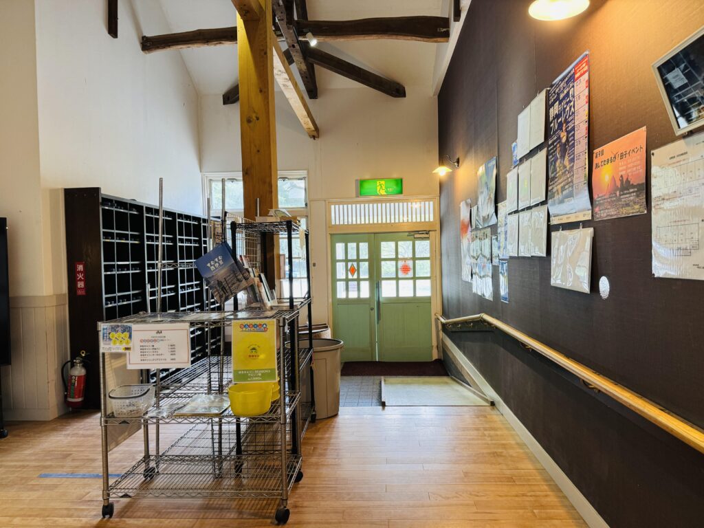 Entrance and front desk area of Yamabiko-so Inn in Nishi-Izu