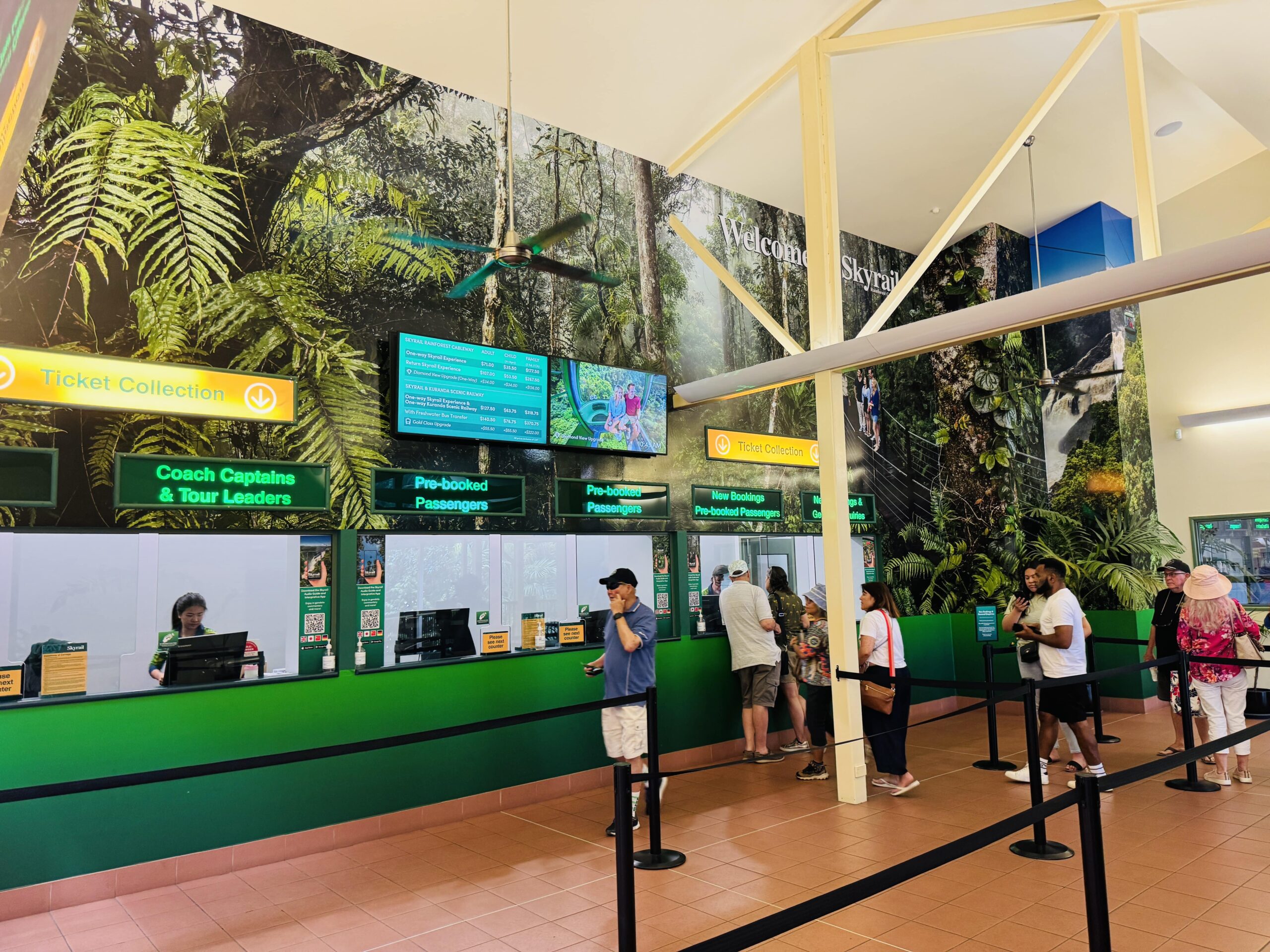 Ticket counters at Skyrail’s Smithfield Terminal, with separate lines for reserved and non-reserved tickets.