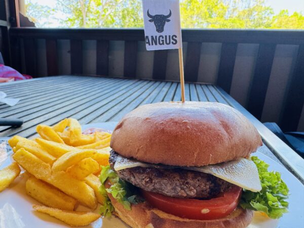 A hearty Angus burger plate served at Kuranda Hotel, one of the restaurant’s most popular dishes.