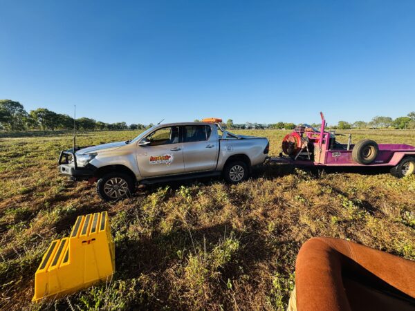The landing area for the hot air balloon on the Mareeba Tablelands near Cairns, with grassy and uneven dirt fields stretching across the landscape.