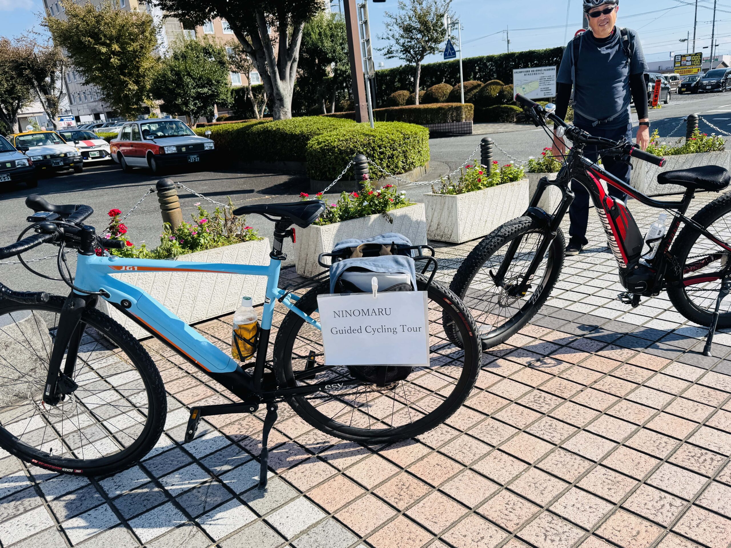 Meeting point in front of Shin-Fuji Station with e-bikes ready for a guided cycling tour