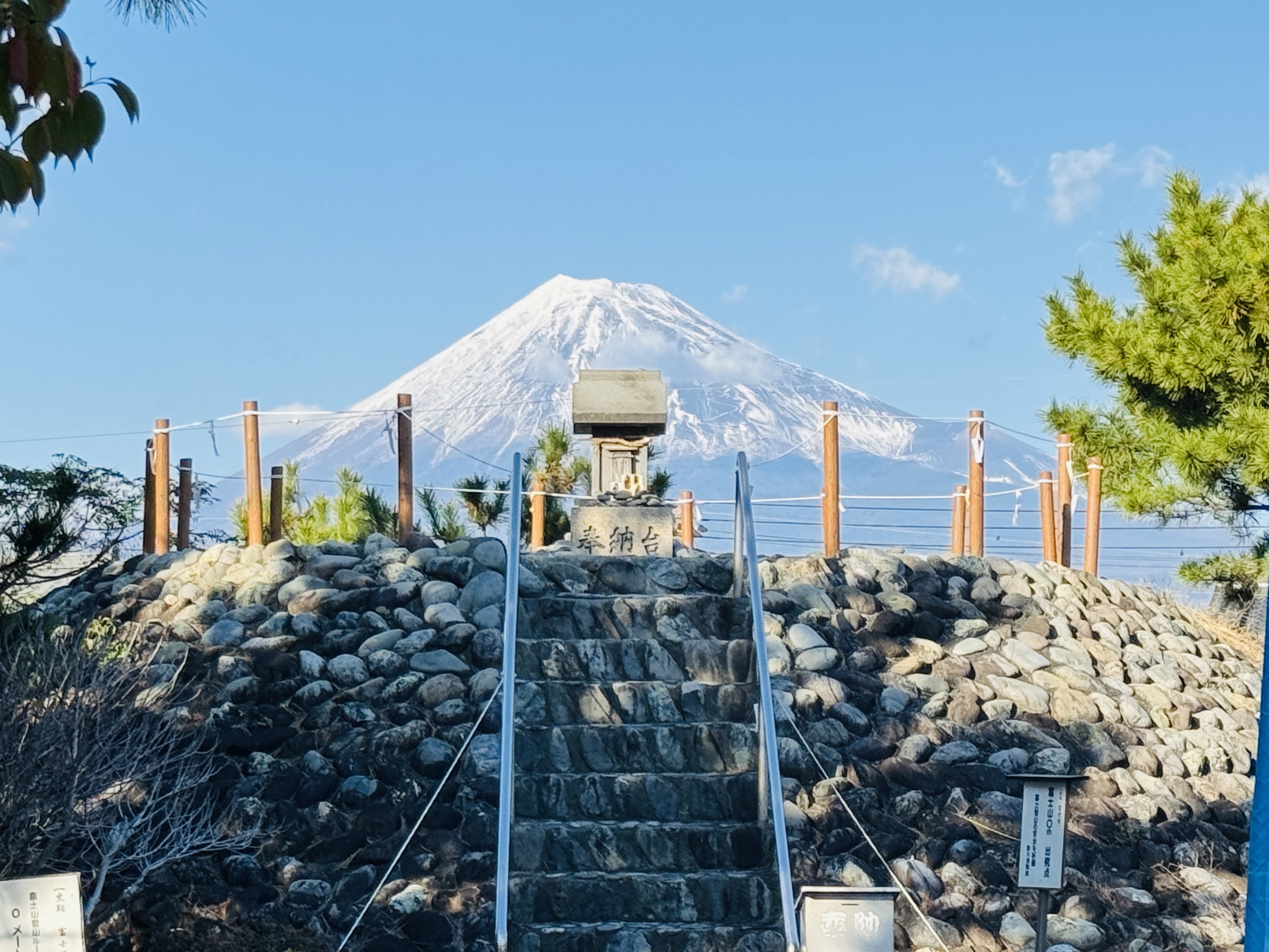 Silhouette of Mt. Fuji aligned with the Suzukawa Fujizuka mound during a guided cycling tour